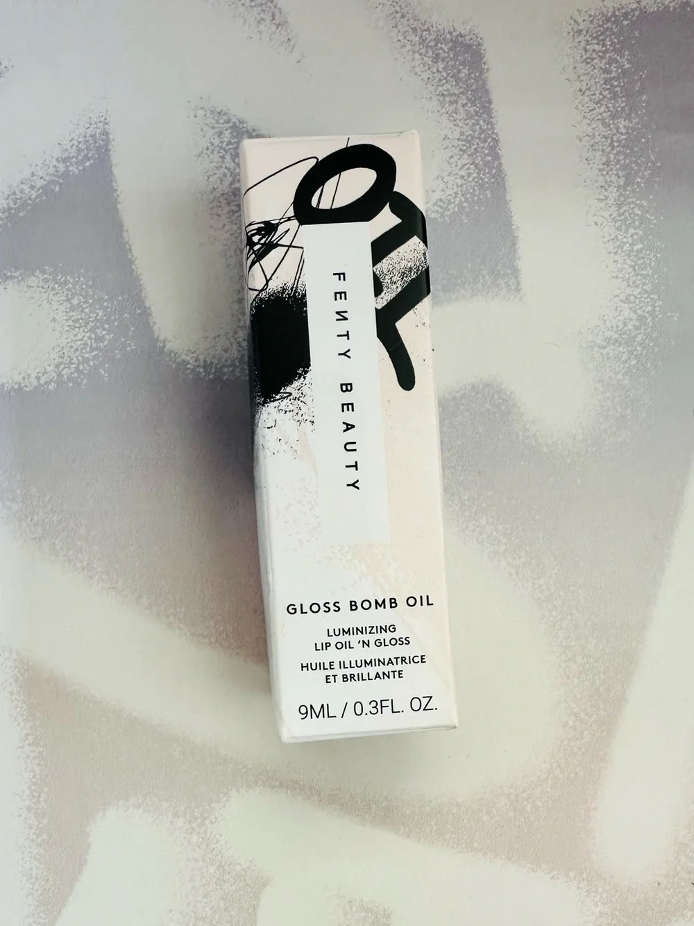Fenty Beauty Gloss Bomb Lip Gloss in Frosted Bunz Sparkling Amber Gold